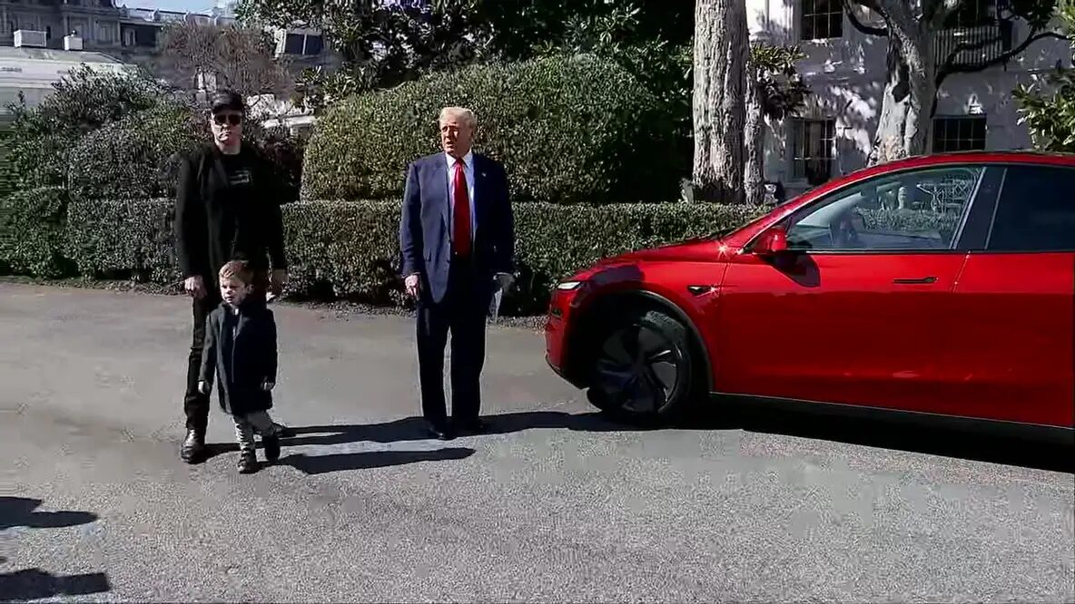 Trump buys a Tesla from Elon Musk at the White House