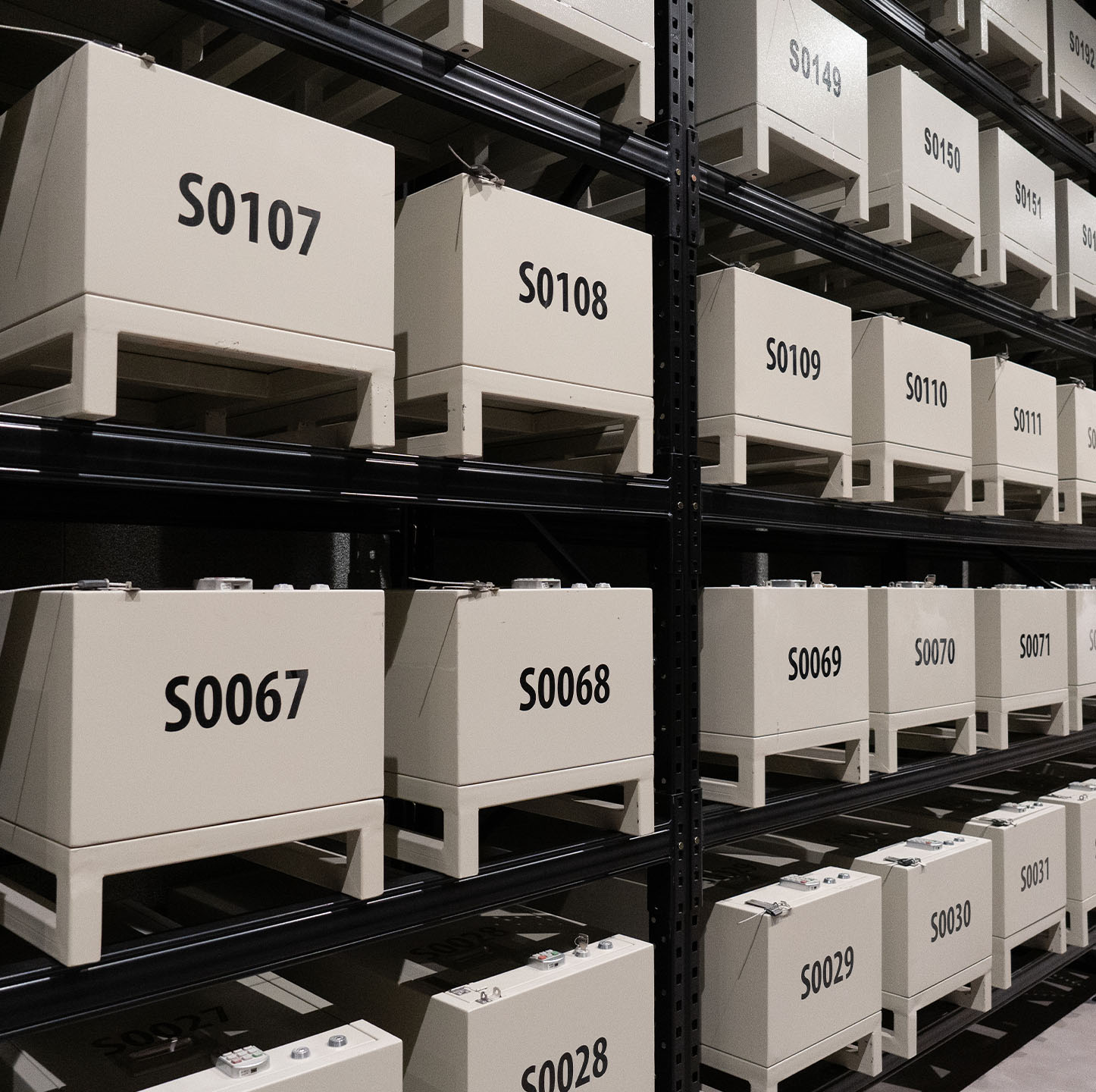 crates of rare metals stored in a secure facility