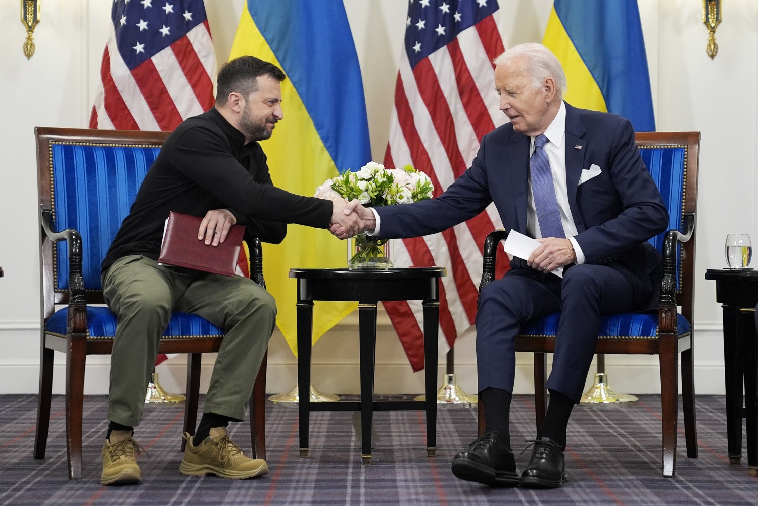 president biden standing beside zelenskyy at press event april 2025