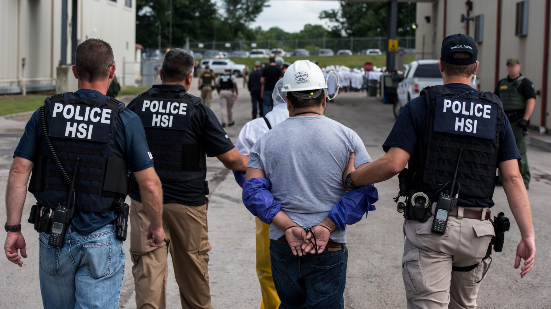 ICE agents arresting illegal immigrants