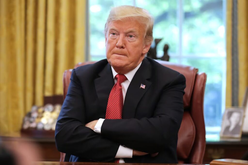 Trump crossed arms in white house