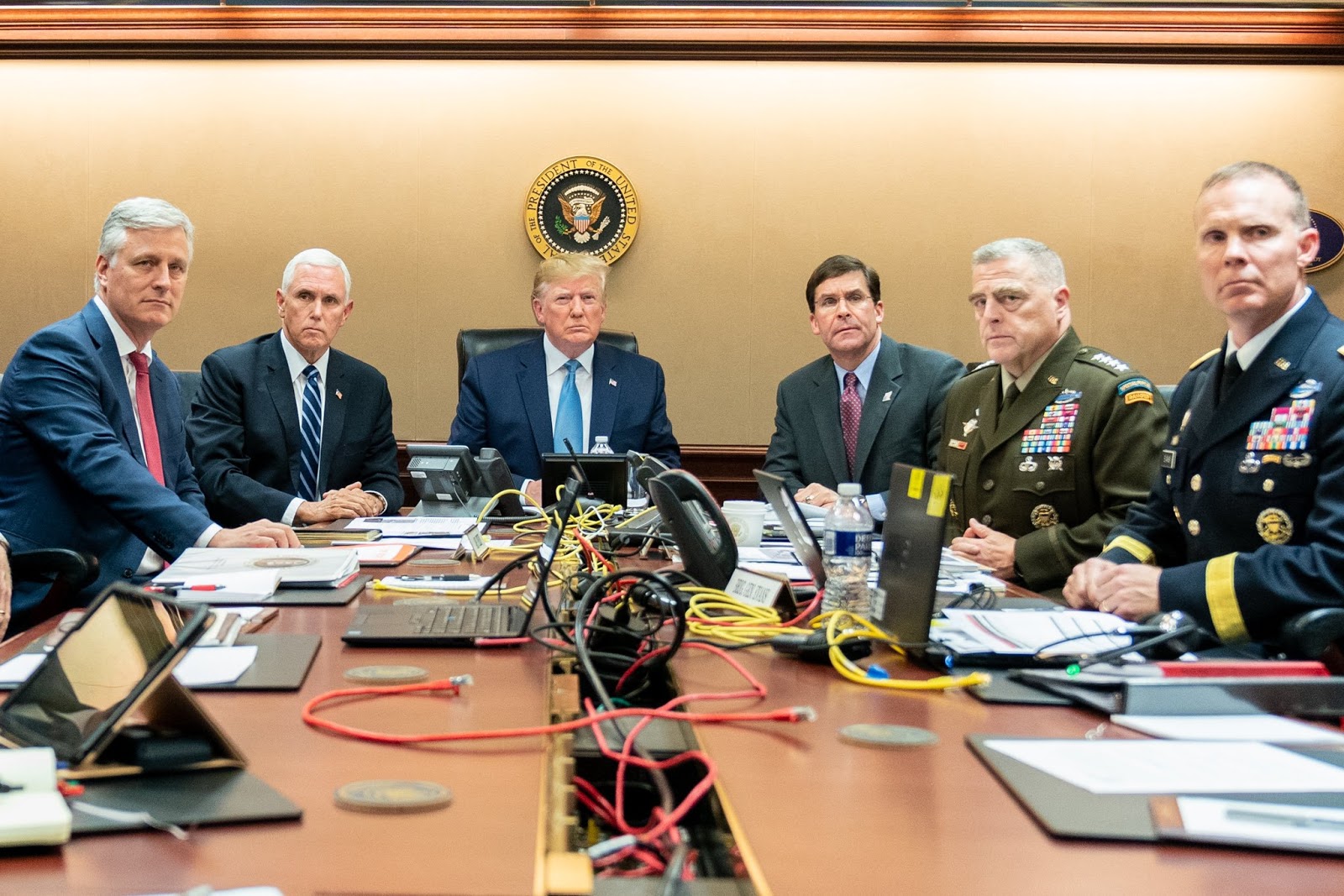 president trump speaking on phone in white house situation room