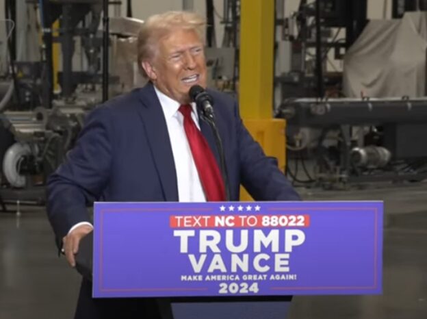 President Trump speaking at a manufacturing facility
