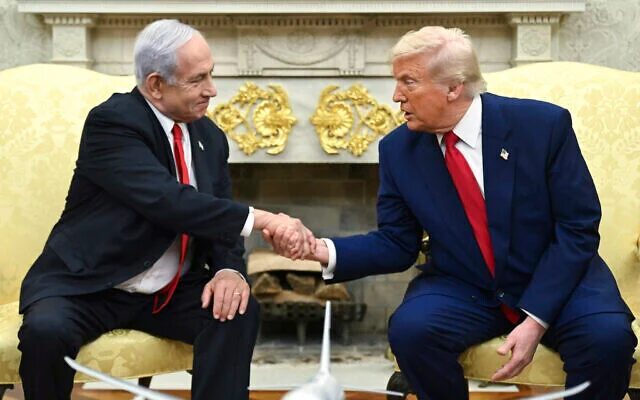 US President Donald Trump, right, shakes the hand of Prime Minister Benjamin Netanyahu in the Oval Office of the White House, April 7, 2025, in Washington. (Pool via AP)