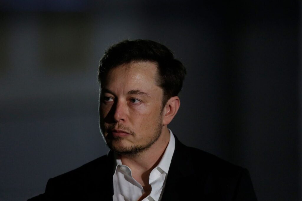 elon musk looking unhappy