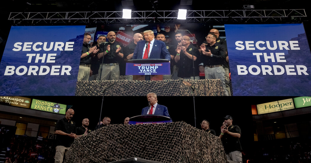 trump rally secure the borders signs