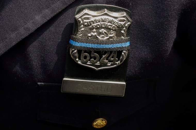 NYPD mourning band on badge