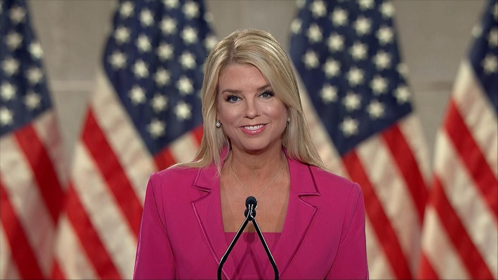 pam bondi in front of american flag