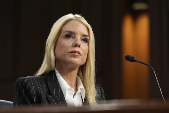 Pam Bondi speaking at DOJ