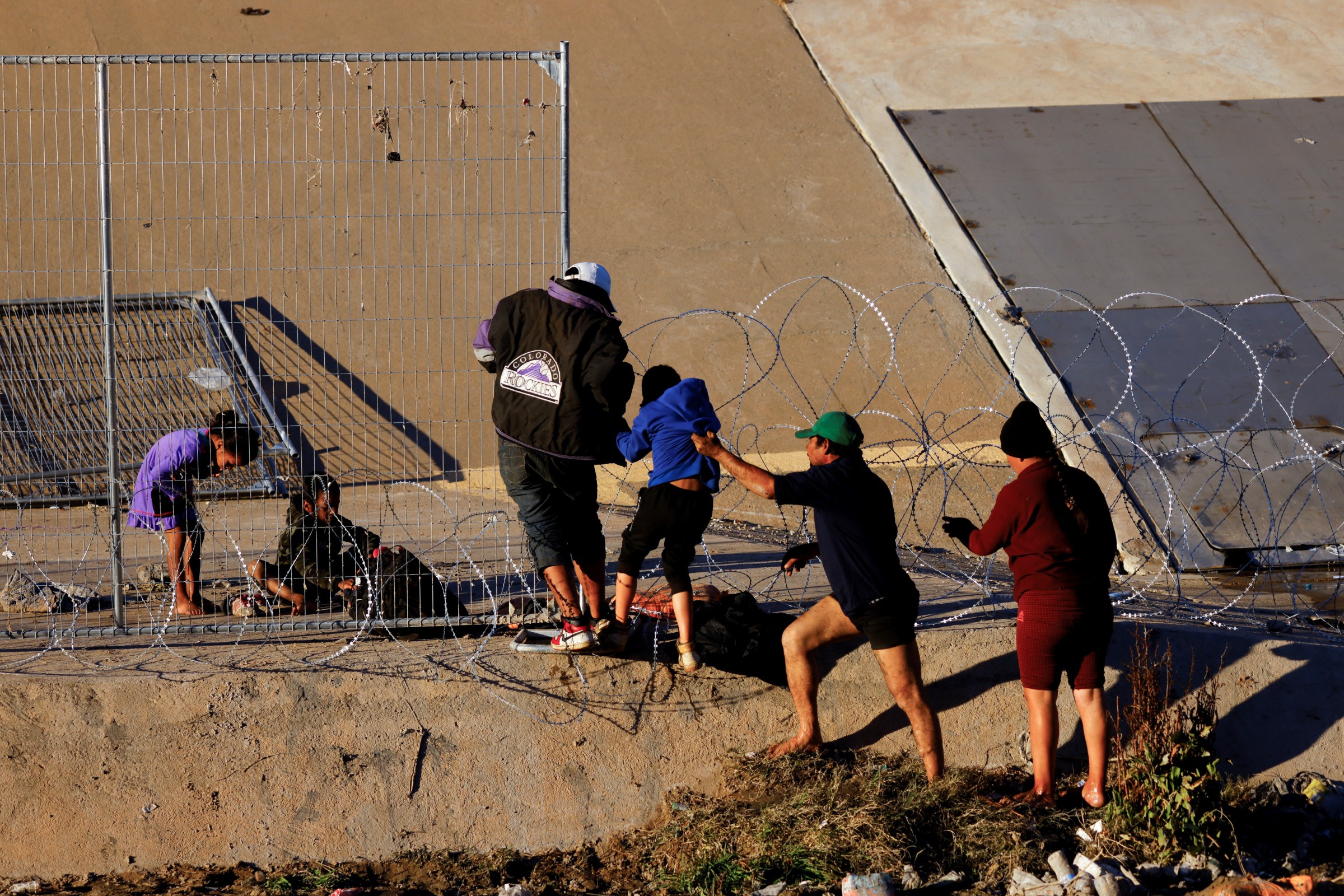 Migrants crossing US Mexico border