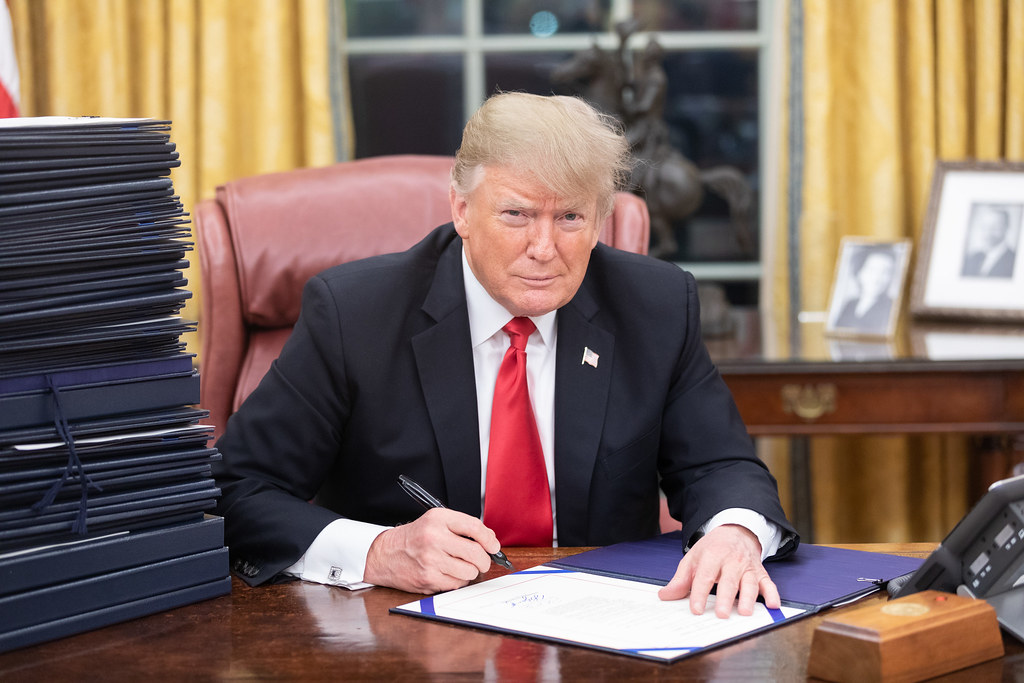 Donald Trump at desk in Oval Office