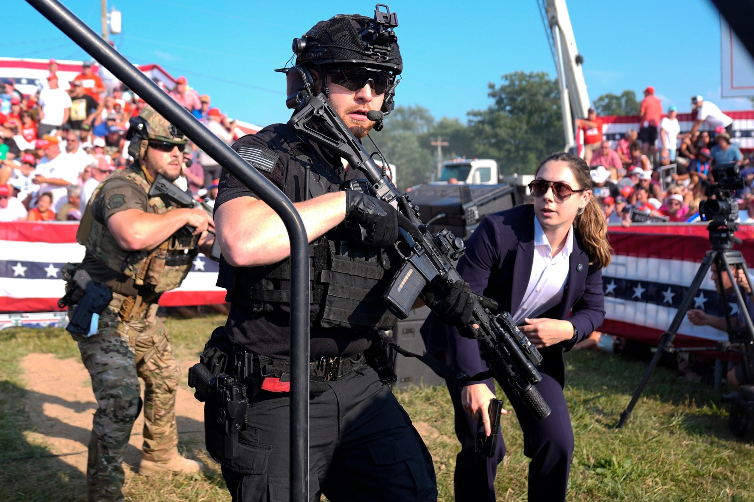 A drone surveillance unit and Secret Service sniper posted during a Trump rally