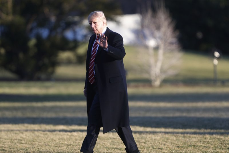 trump walking to white house
