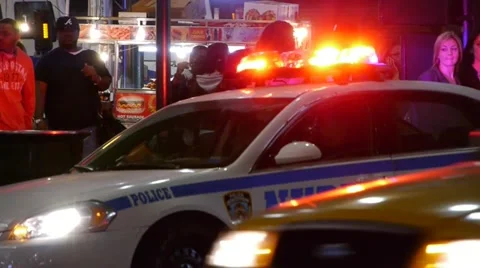 NYPD police car at night