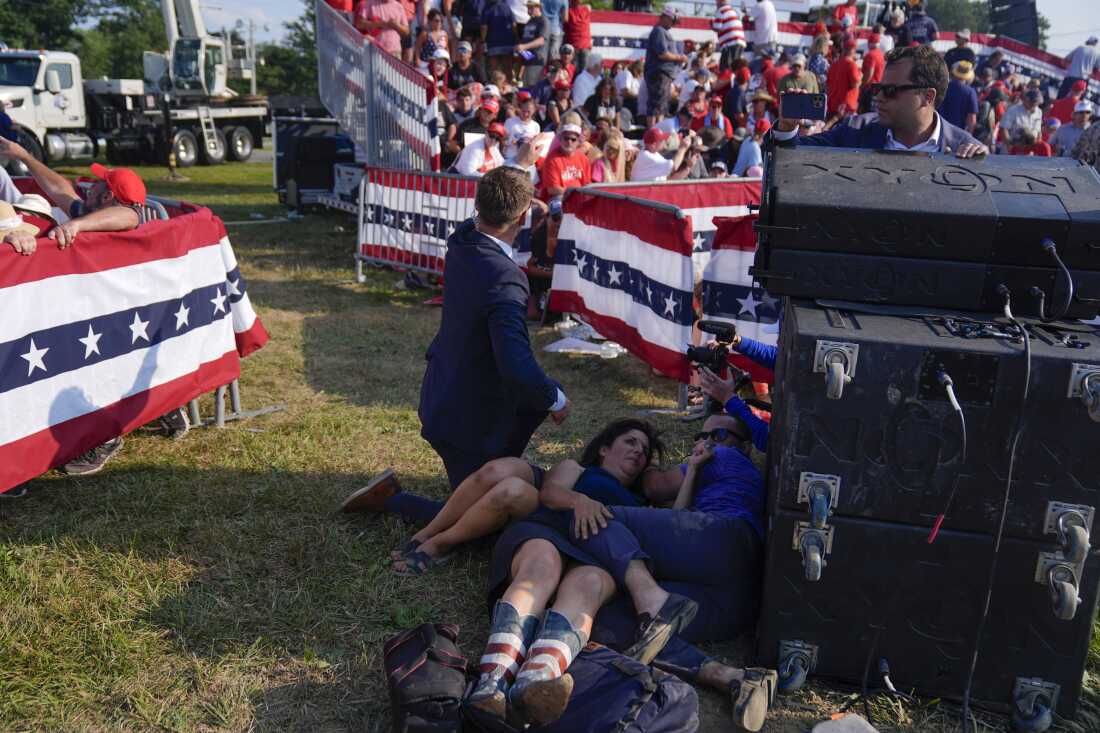 Rally crowd reacting to shots fired at Butler Farm Show