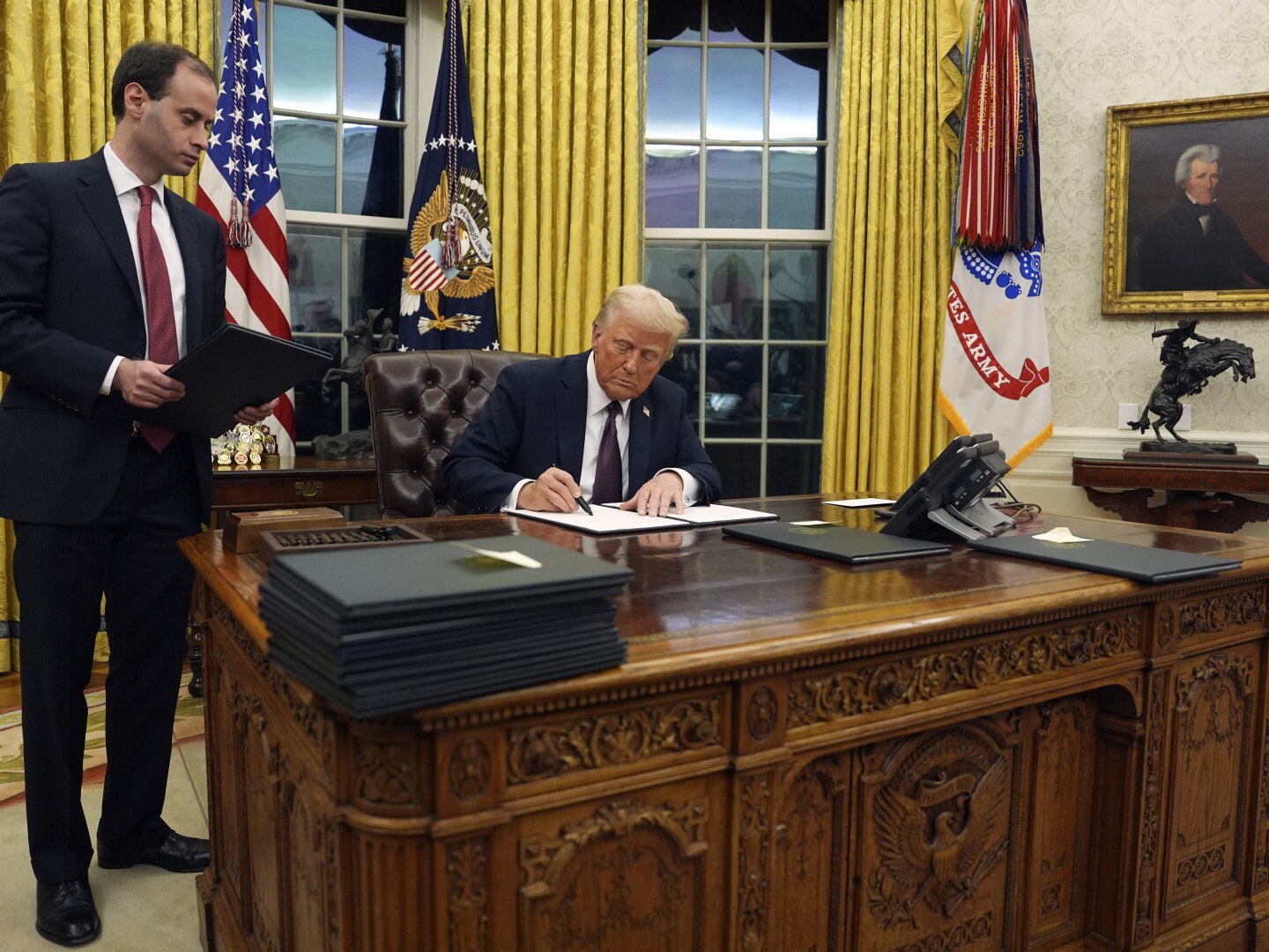 trump signing executive orders in white house oval office