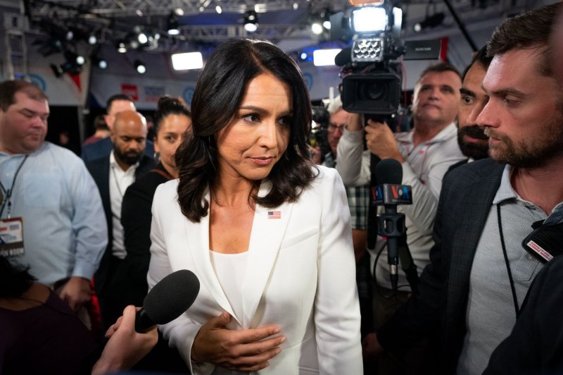 tulsi gabbard talking to reporters