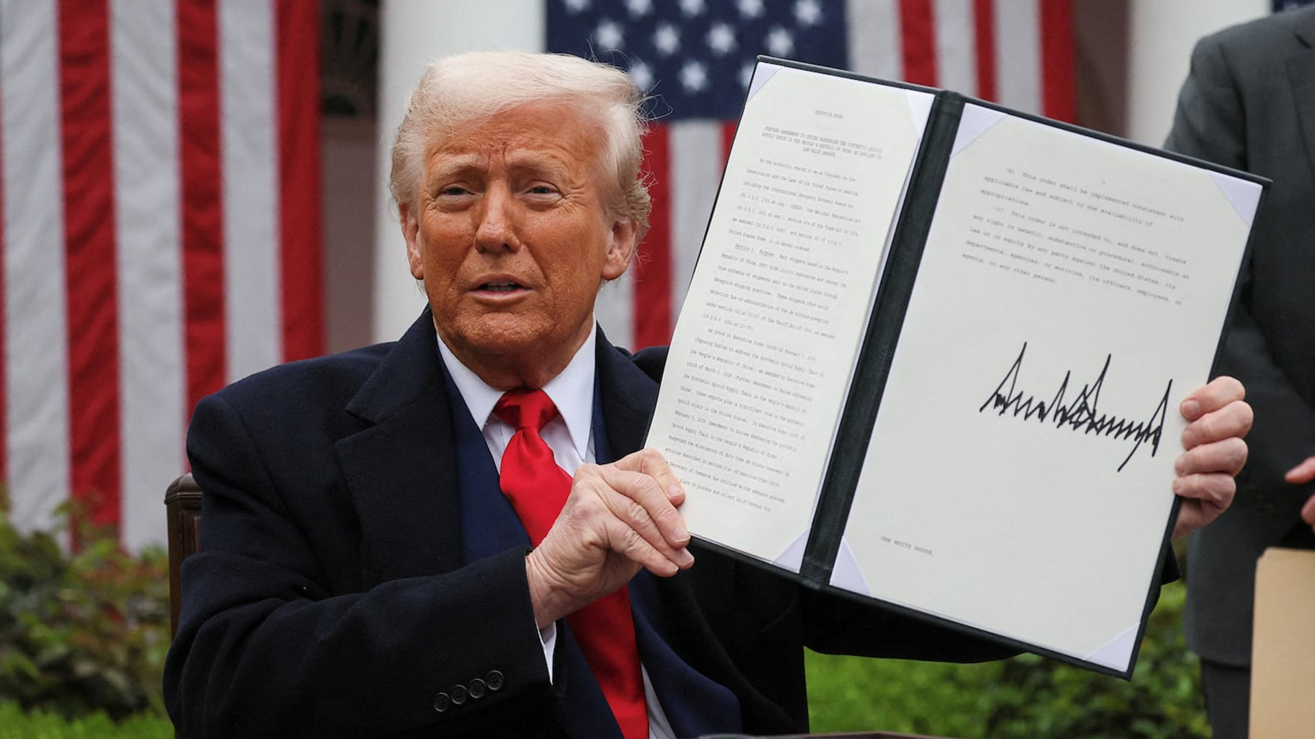 donald trump signing executive order in white house rose garden