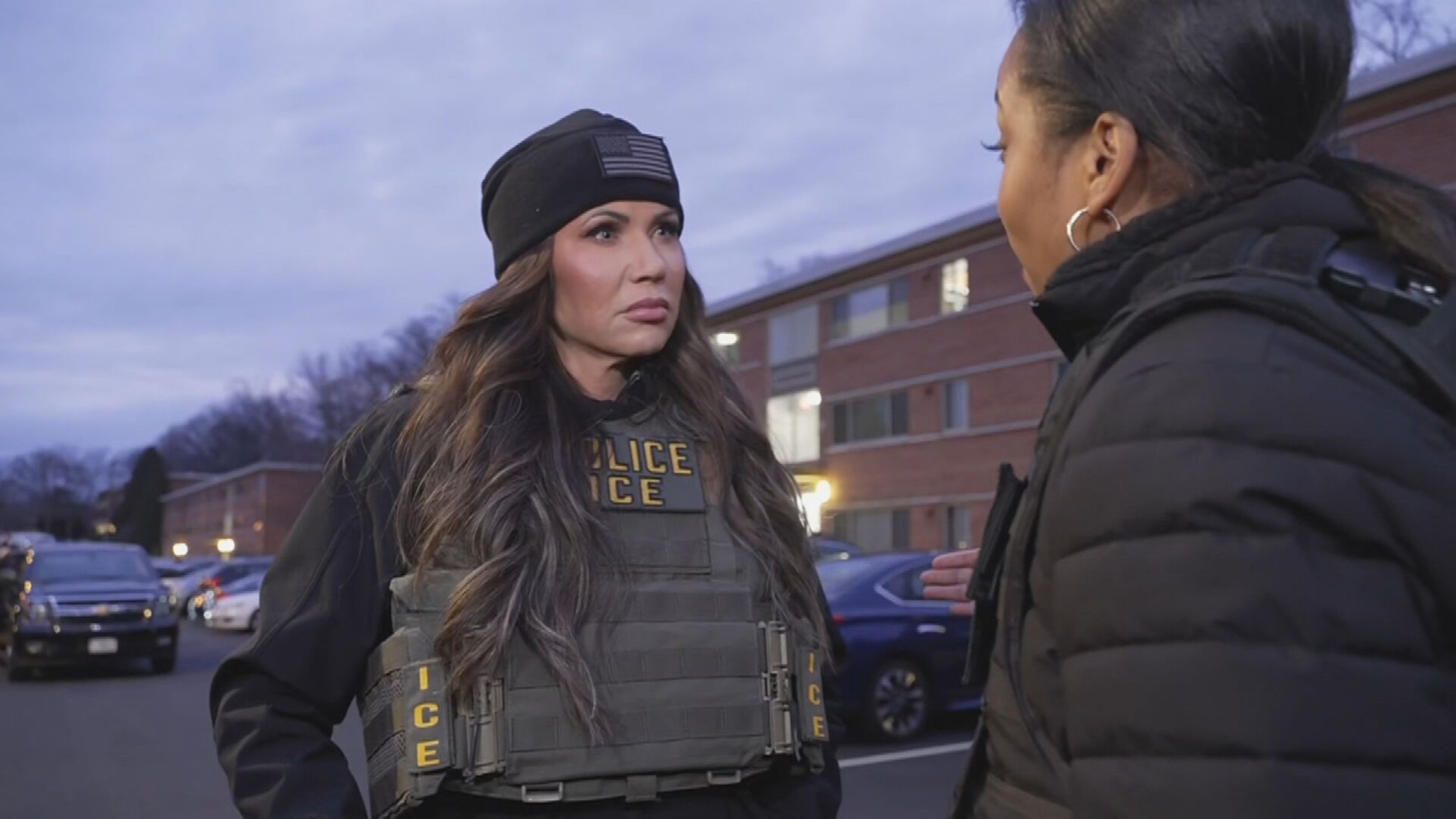Homeland Security Secretary Kristi Noem with ice officers