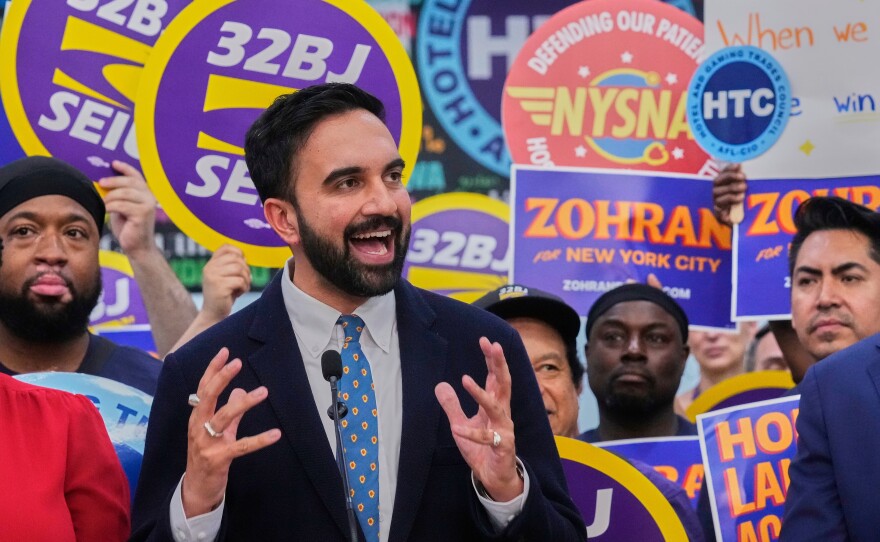 Zohran Mamdani speaking at a rally