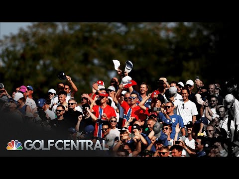 A wide shot of the Ryder Cup golf course at Bethpage Black, with a large crowd in the background