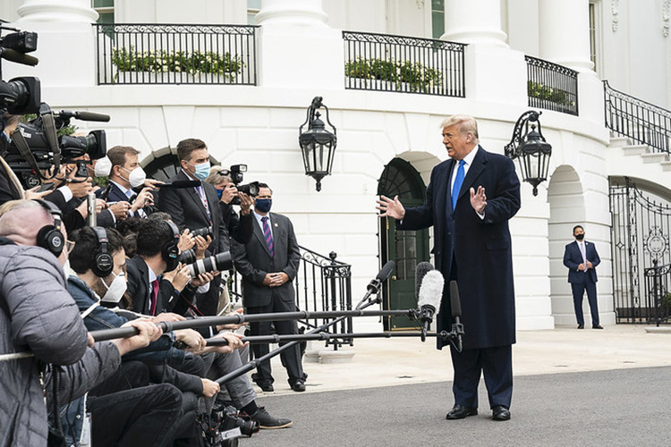 Donald Trump speaking to reporters outside the White House