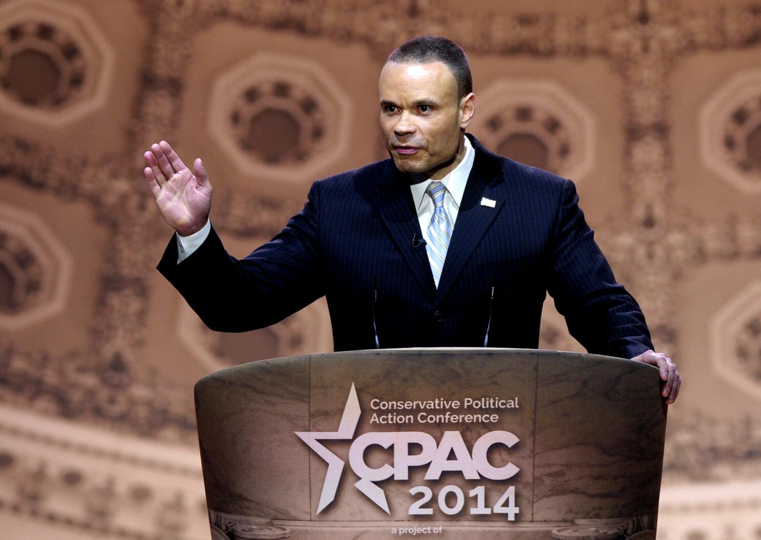 Dan Bongino speaking to press