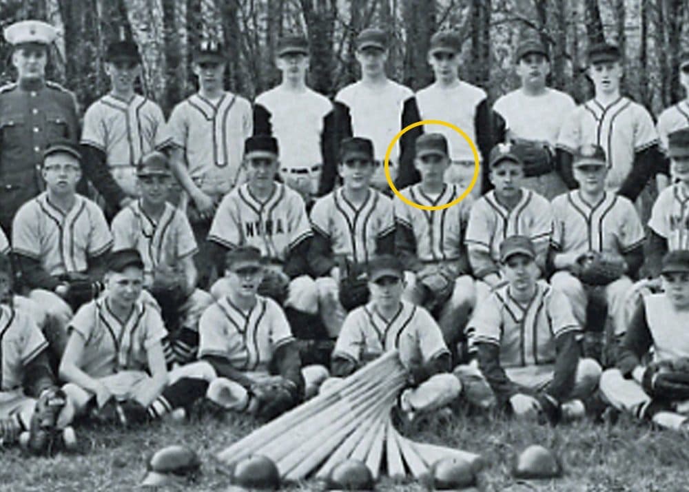 archival photo of a young Donald Trump in a baseball uniform